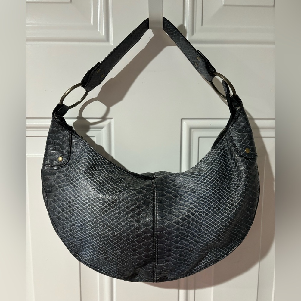 Bag Gray 14” long x 8.5” tall x 2.5” deep Zip closure 3 inside pockets